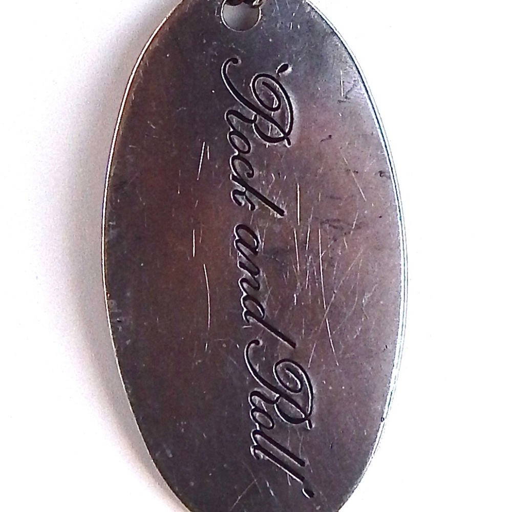 GASOLINE GLAMOUR SILVER TONE ROCK & ROLL PENDANT